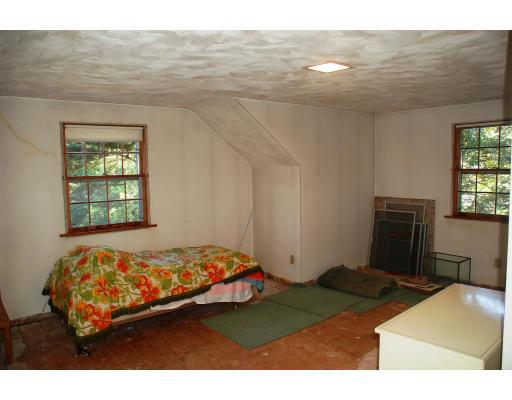 101 Chalmers Street Springfield, MA 01118 - Photo 15 of 19 a bedroom with a bed and a view of bedroom