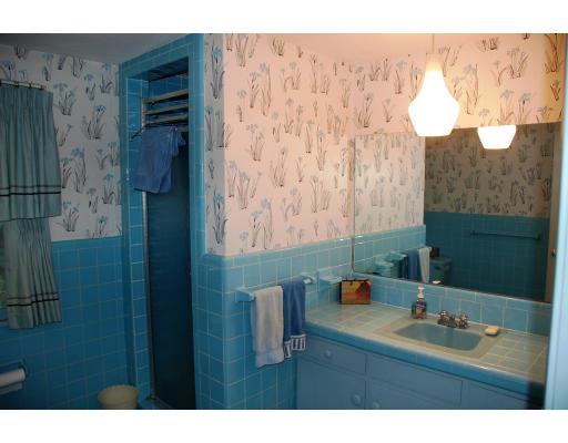 101 Chalmers Street Springfield, MA 01118 - Photo 17 of 19 a bathroom with a sink and a mirror