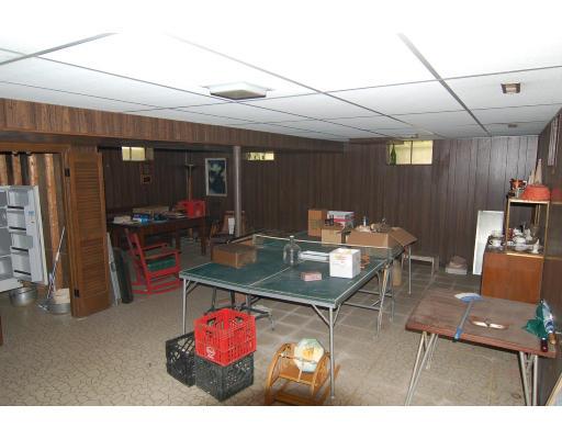101 Chalmers Street Springfield, MA 01118 - Photo 18 of 19 a living room with furniture a flat screen tv and a table