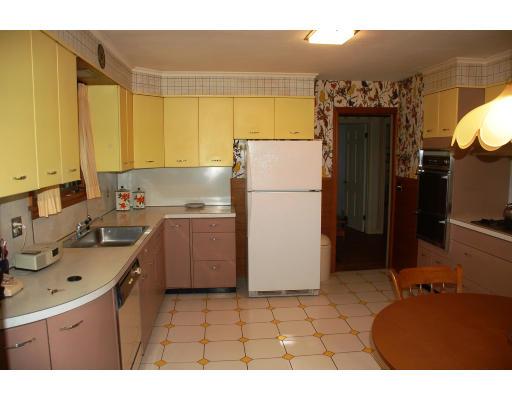 101 Chalmers Street Springfield, MA 01118 - Photo 8 of 19 a kitchen with a refrigerator sink stove and cabinets