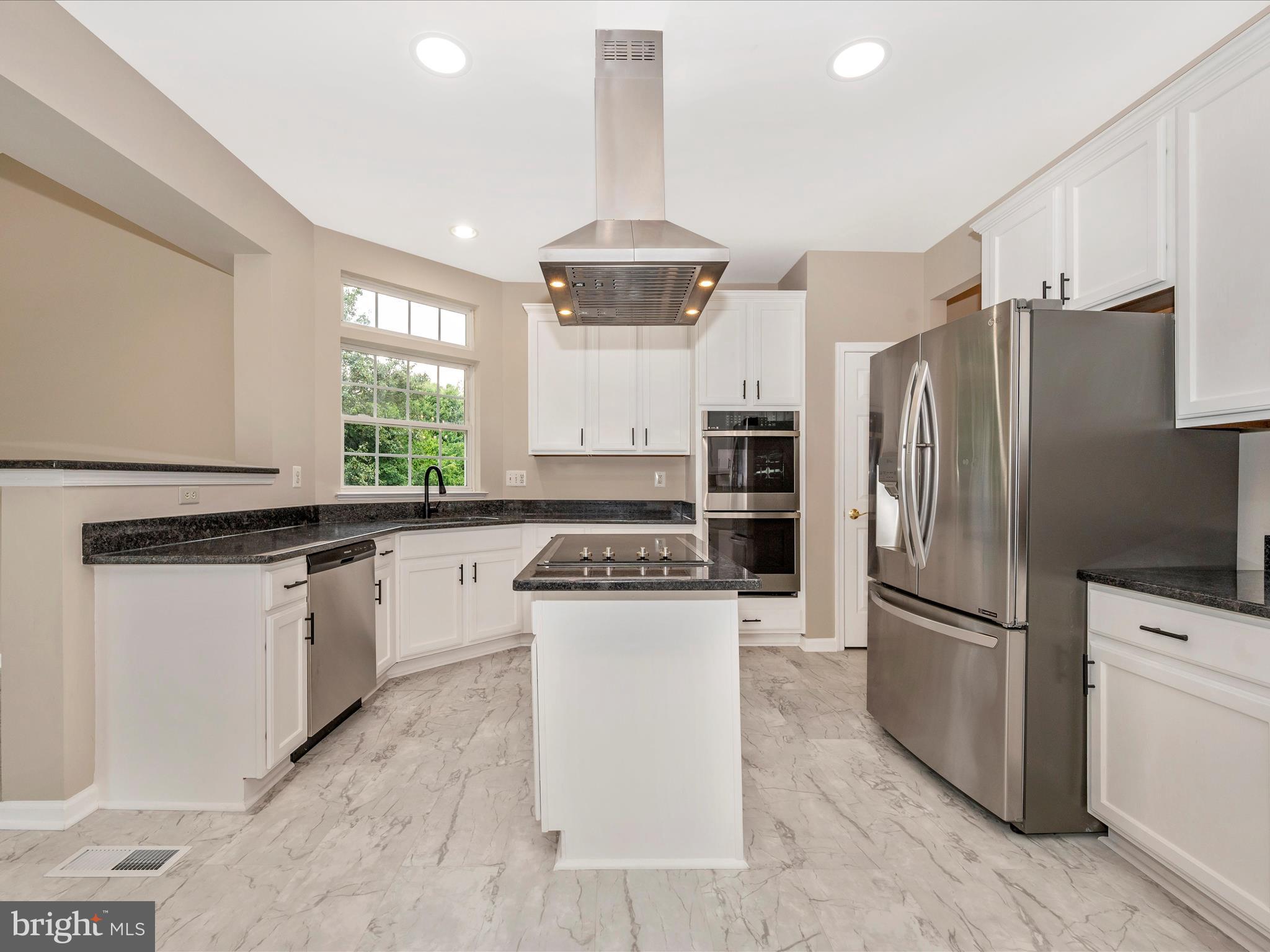 18845 Porterfield Way Germantown, MD 20874 - Photo 10 of 48 Updated kitchen with granite countertops