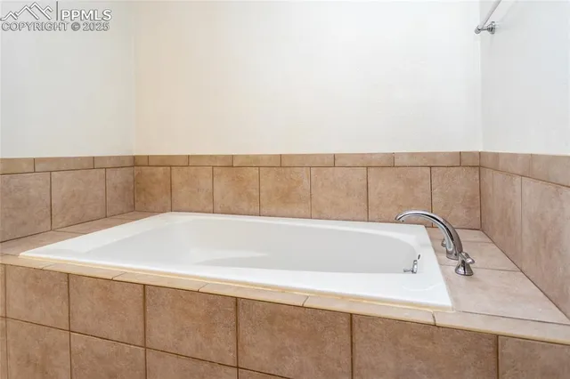 a bathroom with a bathtub