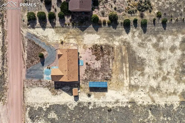 a view of swimming pool with a yard
