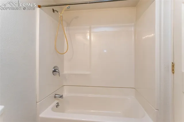 a close up of a bathtub in a bathroom