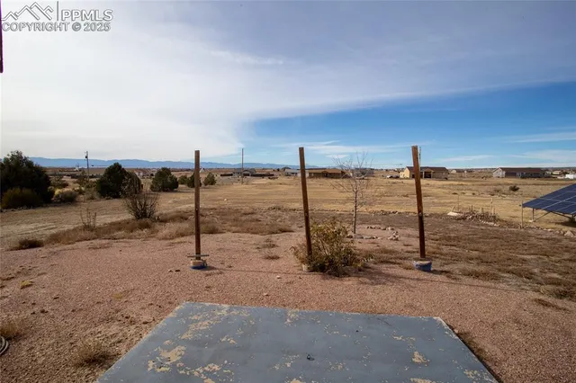 a view of a road with an ocean view