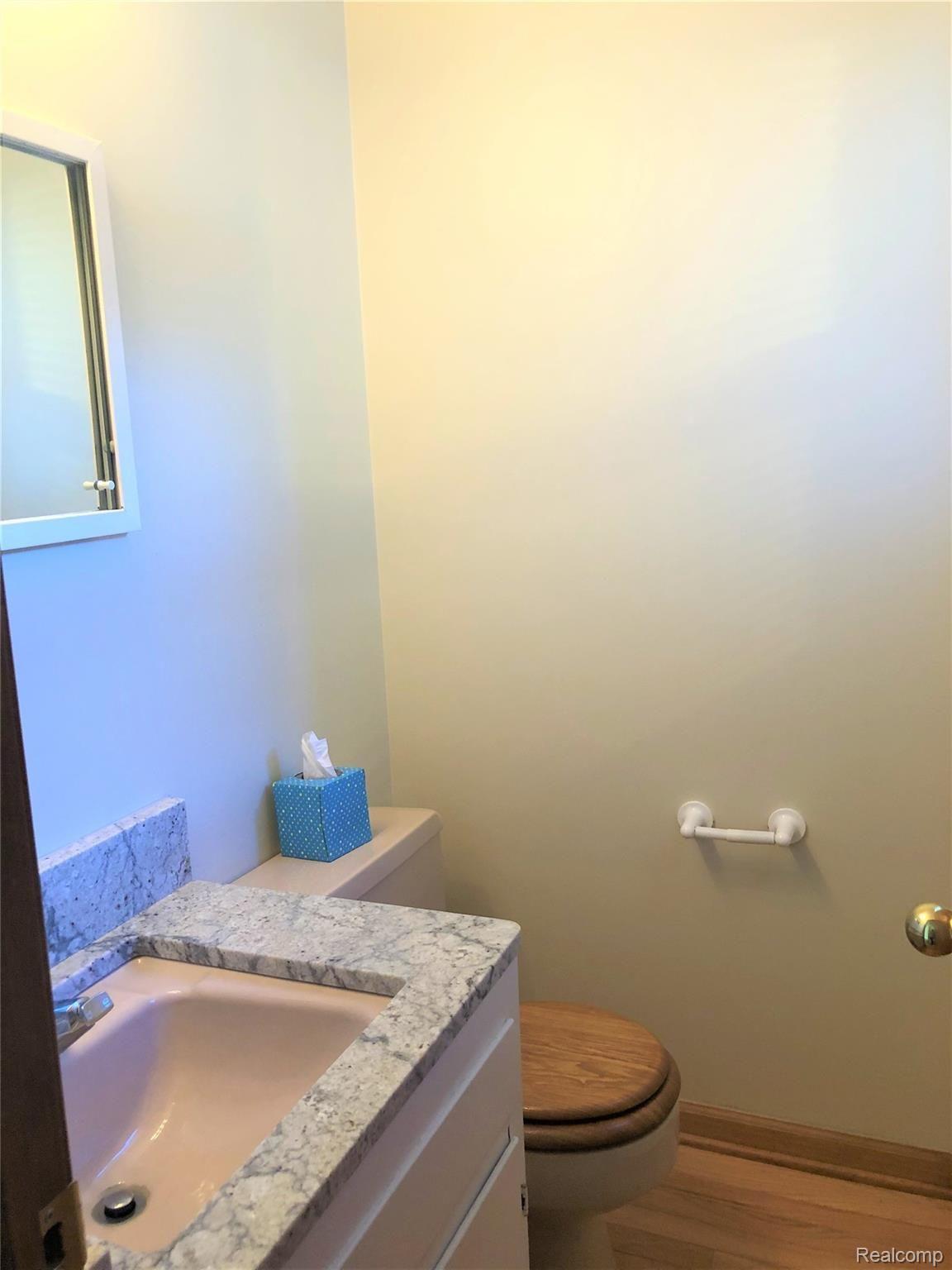 1207 Reid Road Flint, MI 48507 - Photo 26 of 42 13 Half Bath a.jpg