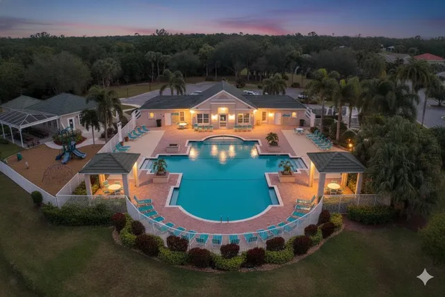 an aerial view of a house with a garden
