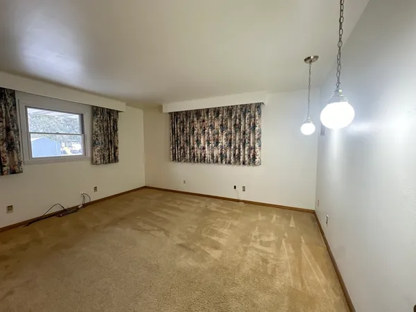 an empty room with windows