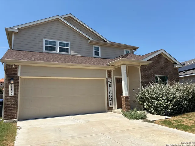 a front view of house with yard