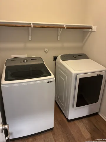 a utility room with dryer and washer