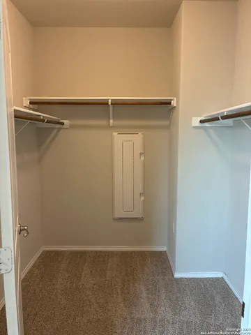 a view of an empty walk in closet