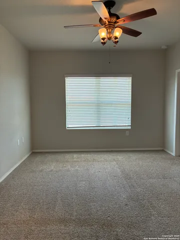 a view of a livingroom with a window