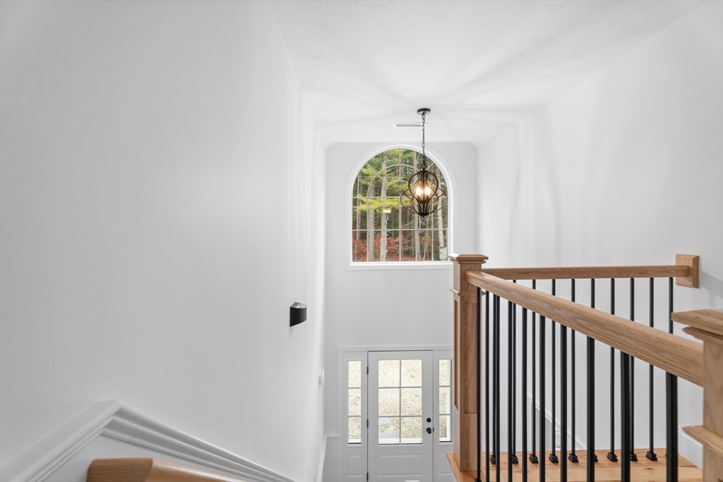 37 Tarkiln Road Kingston, MA 02364 - Photo 21 of 42 wooden floor in a hall with a window