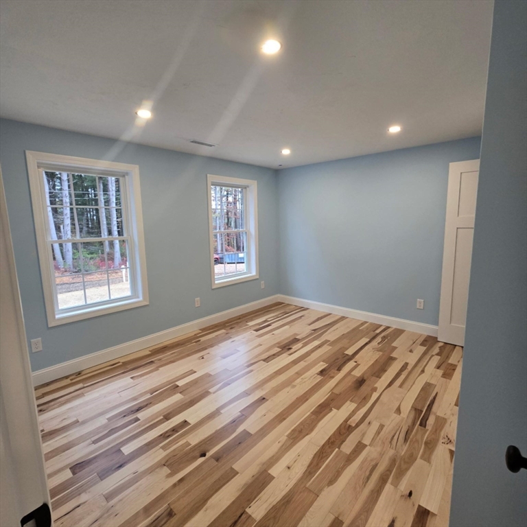 37 Tarkiln Road Kingston, MA 02364 - Photo 31 of 42 a view of empty room with wooden floor and fan