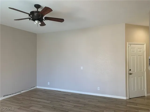 a view of room with hardwood floor
