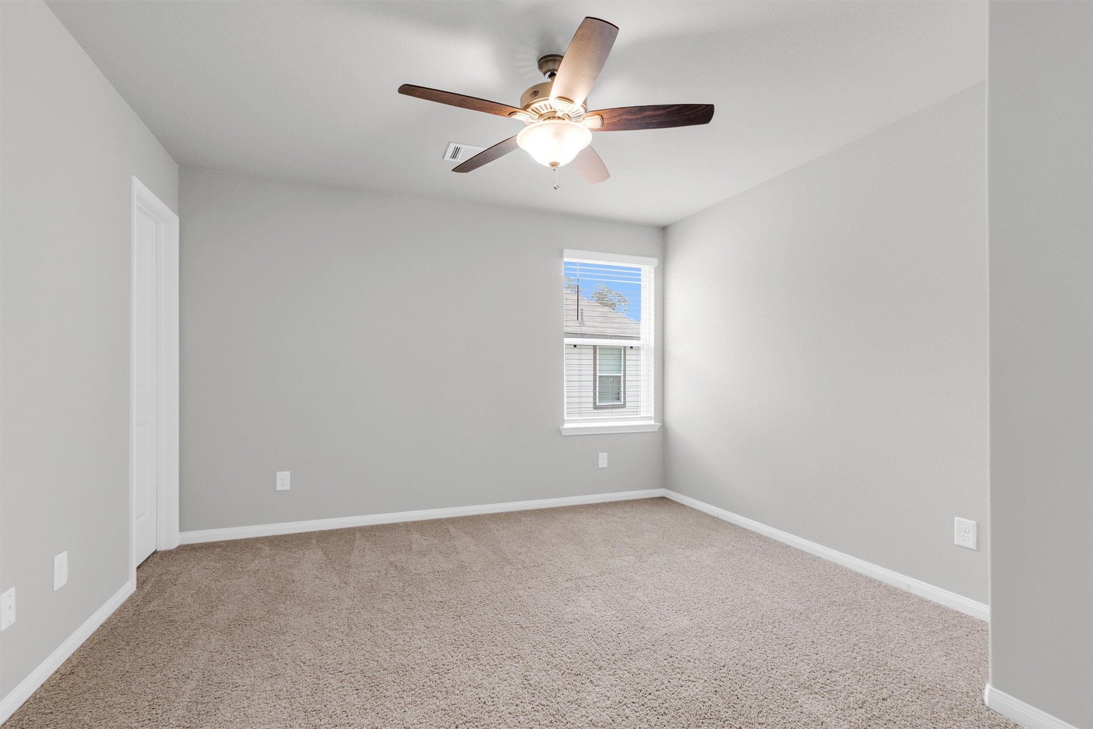 13534 Luke Prairie Willis, TX 77378 - Photo 23 of 29 Secondary bedroom upstairs.