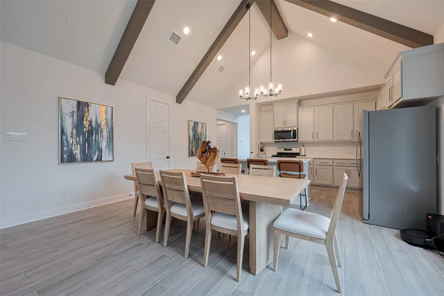 a white toilet sitting next to a shower curtain