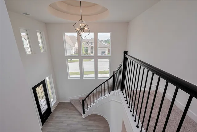 a kitchen with cabinets stainless steel appliances and a sink