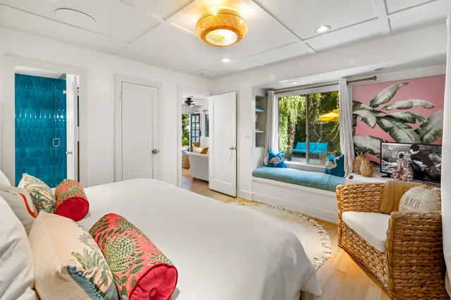 a bedroom with a bed and a couch