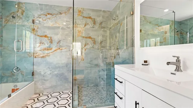 a bathroom with a sink and a shower