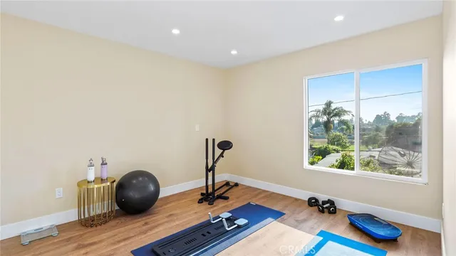 a very nice looking room with wooden floor