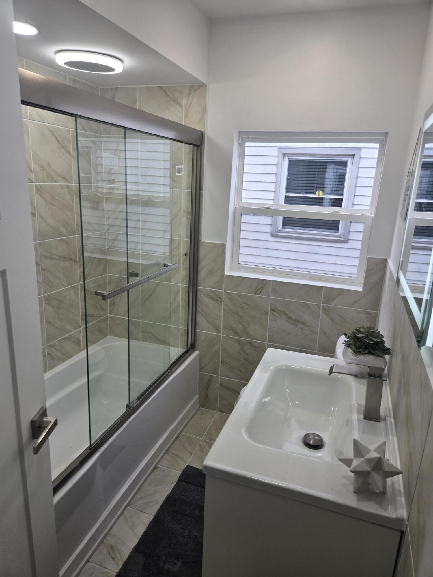4578 North 127th Street Butler, WI 53007 - Photo 13 of 28 Main level bathroom