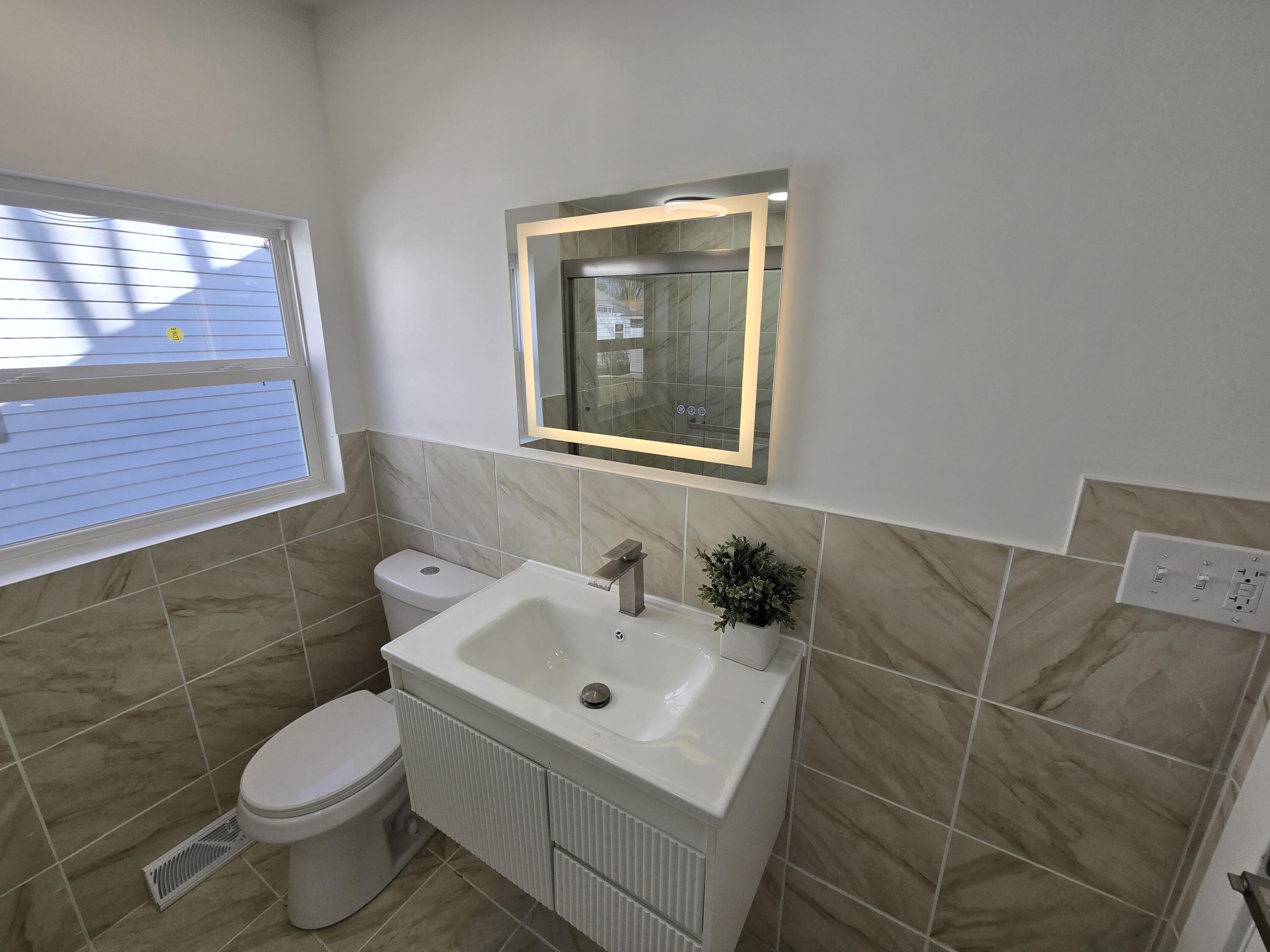 4578 North 127th Street Butler, WI 53007 - Photo 17 of 37 Main Level Bathroom