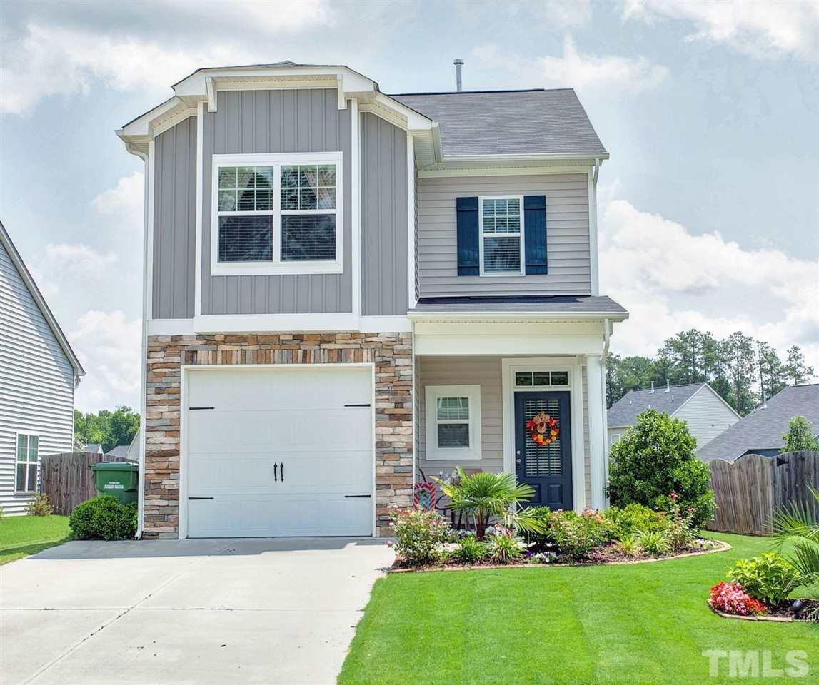 645 Smith Ridge Way Fuquay-Varina, NC 27526 - Photo 1 of 25 Love the stone accent around the garage! Even the garage door has nice accents...
