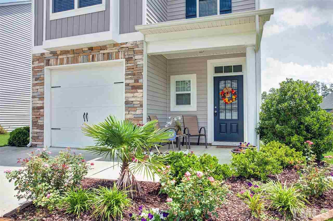 645 Smith Ridge Way Fuquay-Varina, NC 27526 - Photo 2 of 25 Gorgeous, happy landscaping ... what a way to be greeted when you arrive home!