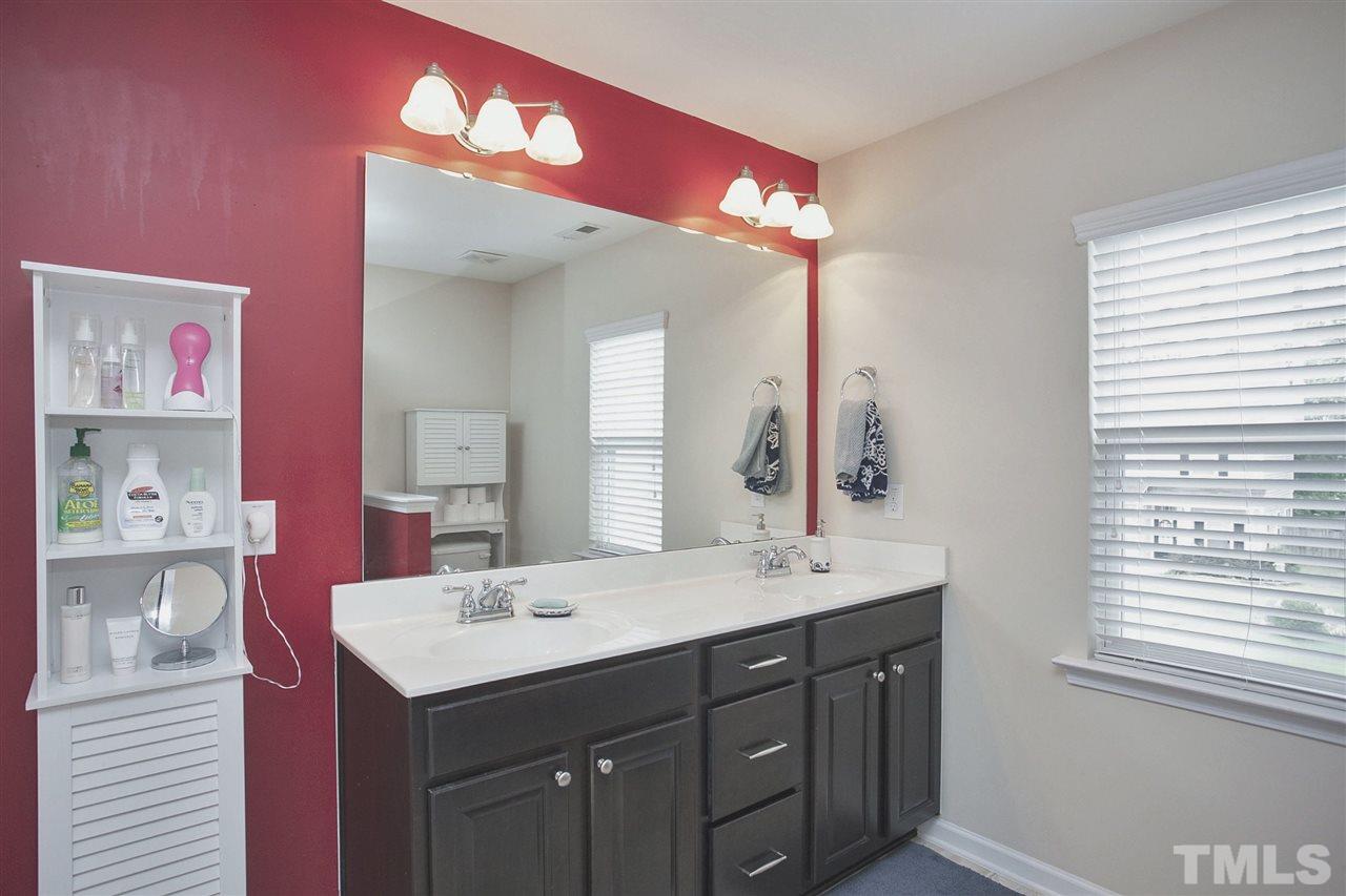 645 Smith Ridge Way Fuquay-Varina, NC 27526 - Photo 16 of 25 Double vanity provides convenience, great counter space & lots of storage ... really nice fixtures ....