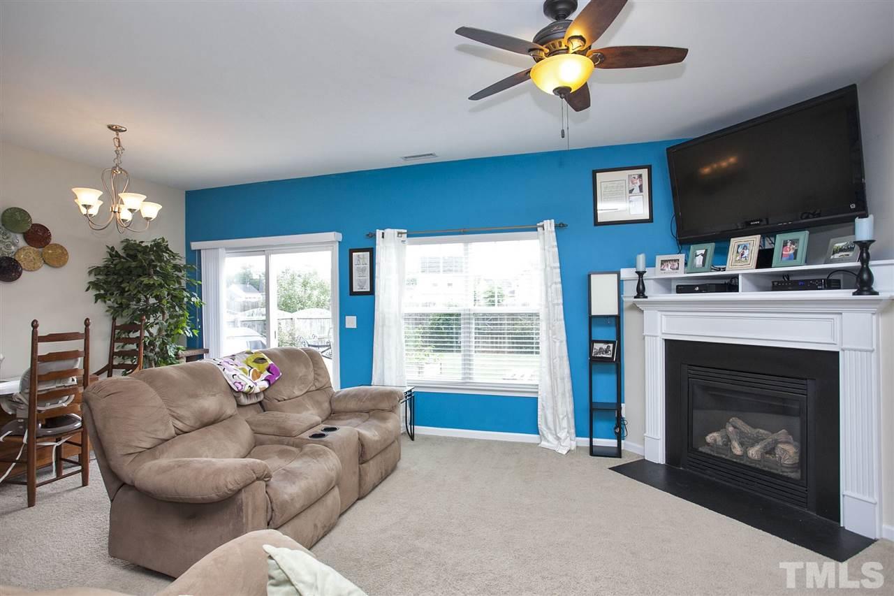 645 Smith Ridge Way Fuquay-Varina, NC 27526 - Photo 9 of 25 Lots of natural light ... look out over the great backyard!