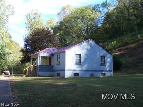 110 Co Rte 9/6 Spencer, WV 25276 - Photo 12 of 18 New metal roof