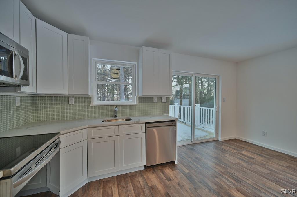 139 Winter Hill Road Effort, PA 18330 - Photo 14 of 50 a kitchen with a sink cabinets and wooden floor
