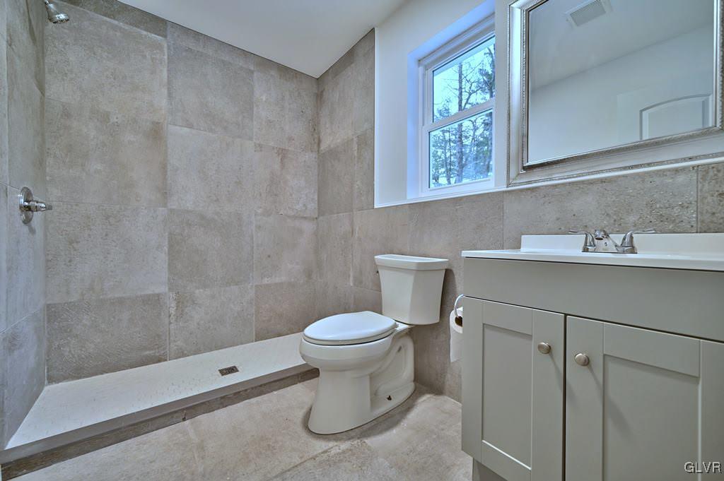 139 Winter Hill Road Effort, PA 18330 - Photo 21 of 50 a bathroom with a sink toilet and shower