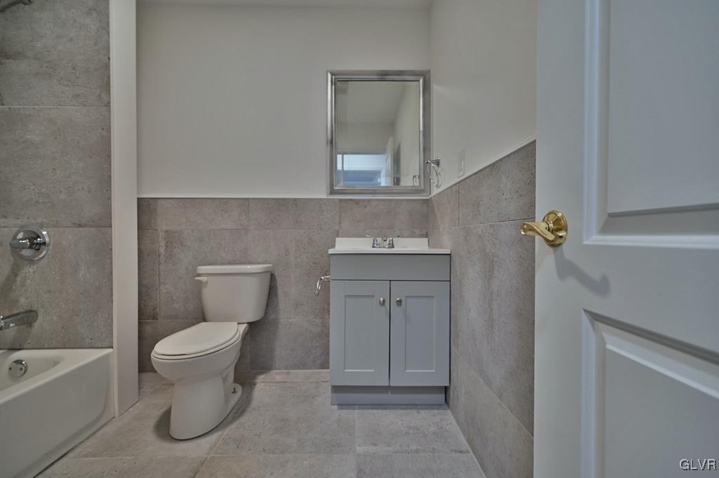 139 Winter Hill Road Effort, PA 18330 - Photo 33 of 50 a bathroom with a toilet sink and mirror