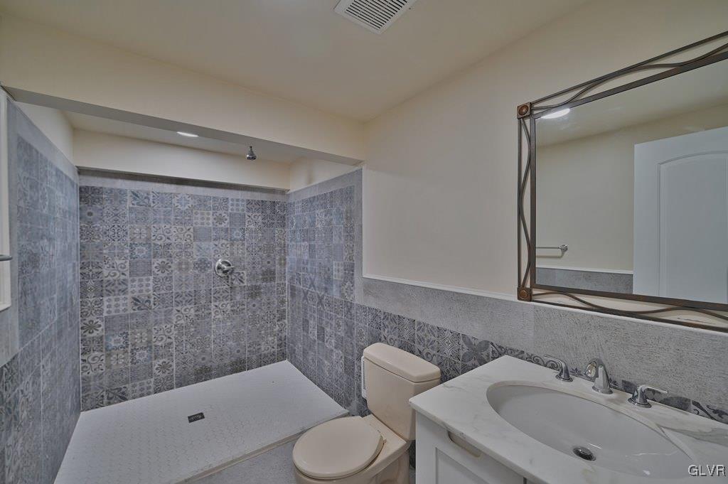 139 Winter Hill Road Effort, PA 18330 - Photo 43 of 50 a bathroom with a sink toilet and shower