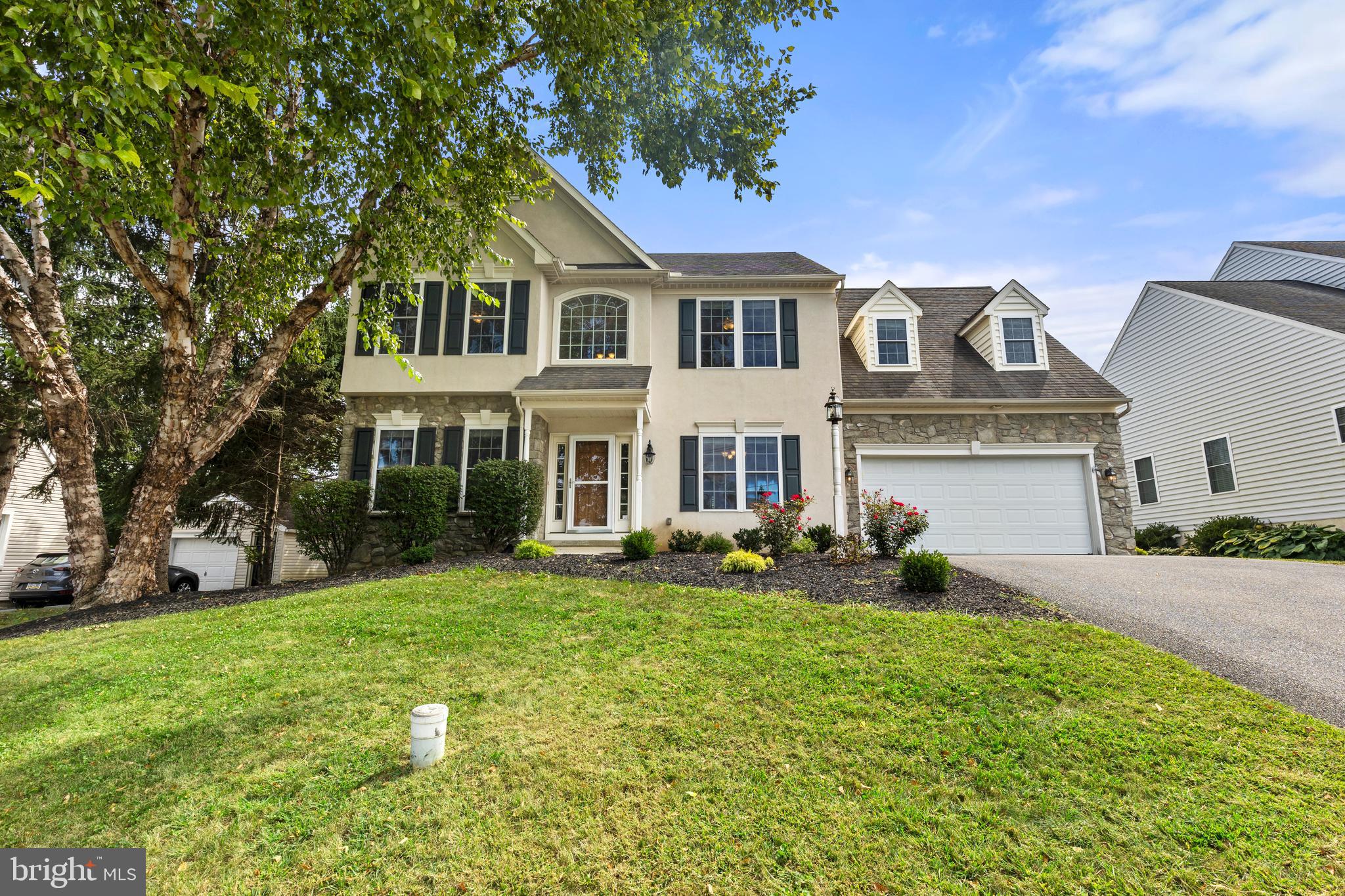 2717 Kreider Road Lititz, PA 17543 - Photo 1 of 33 a front view of a house with a yard and trees