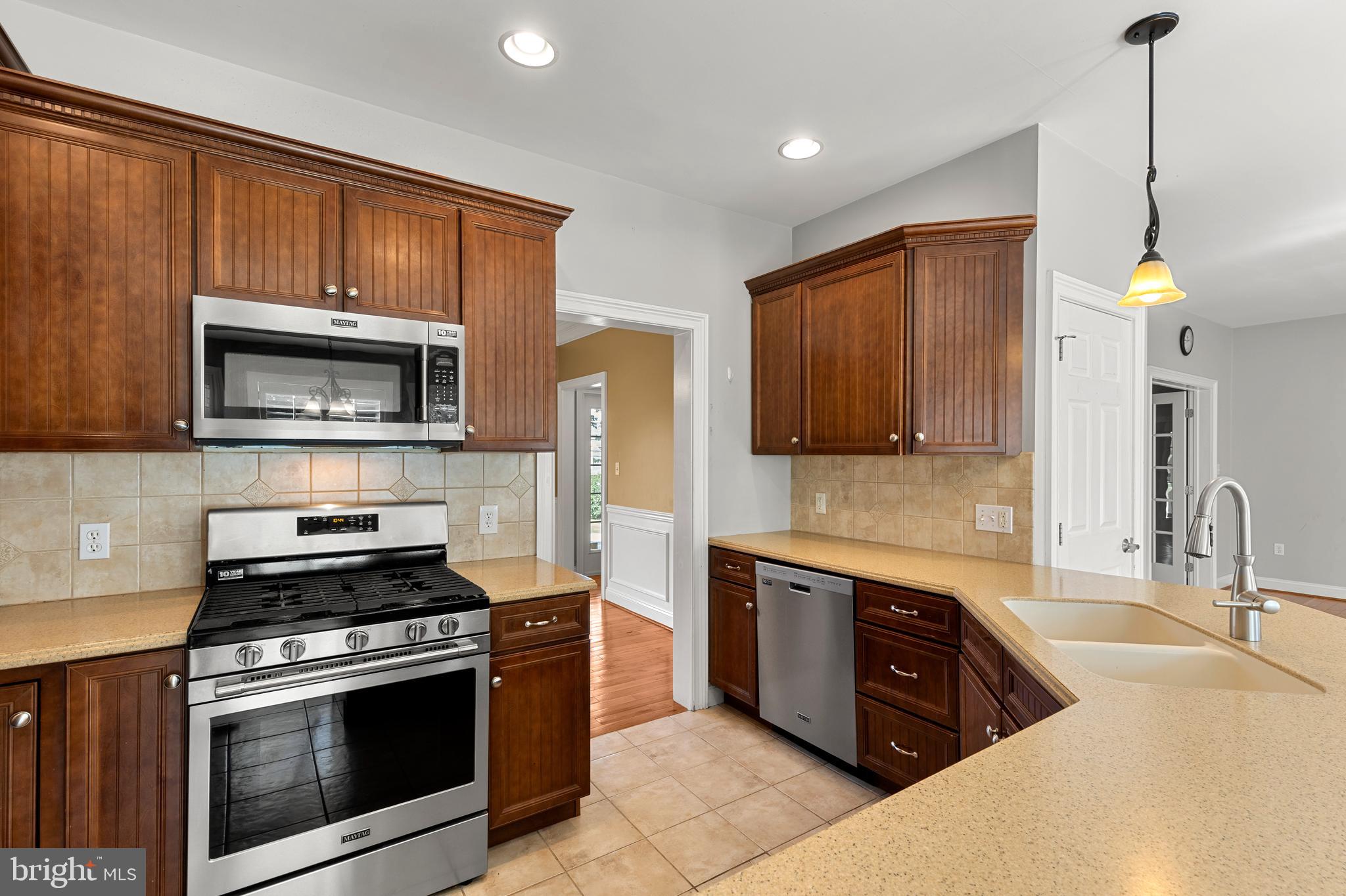 2717 Kreider Road Lititz, PA 17543 - Photo 11 of 33 a kitchen with a stove microwave and sink