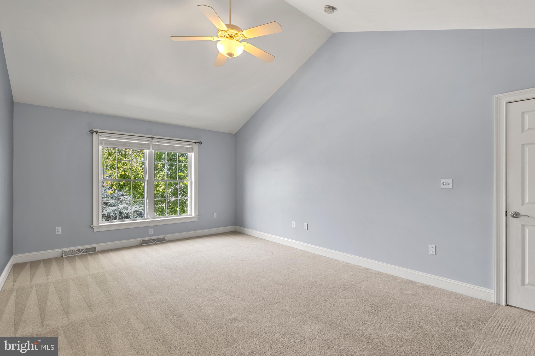 2717 Kreider Road Lititz, PA 17543 - Photo 18 of 33 an empty room with a window and a ceiling fan