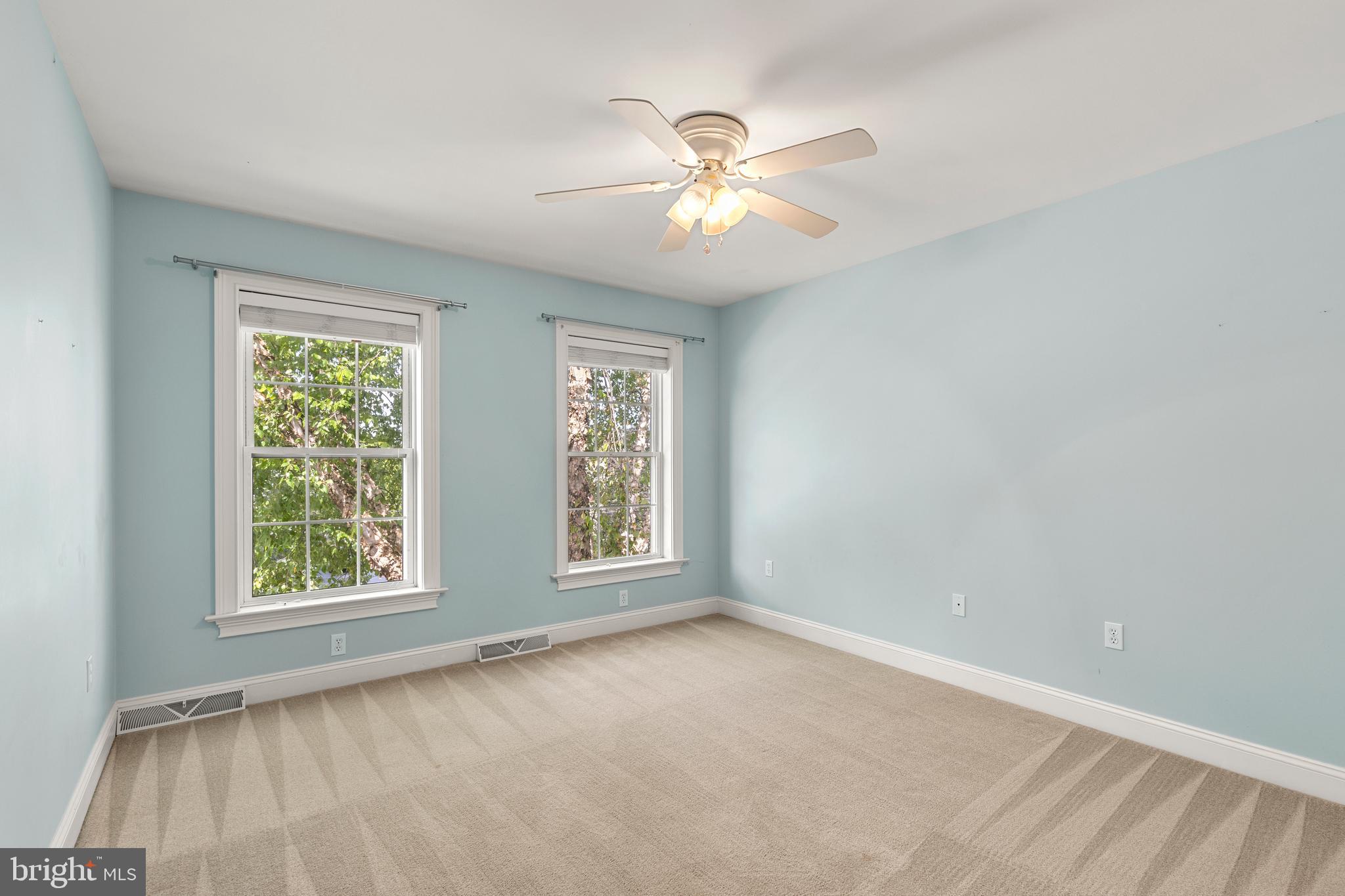 2717 Kreider Road Lititz, PA 17543 - Photo 24 of 33 an empty room with windows and fan