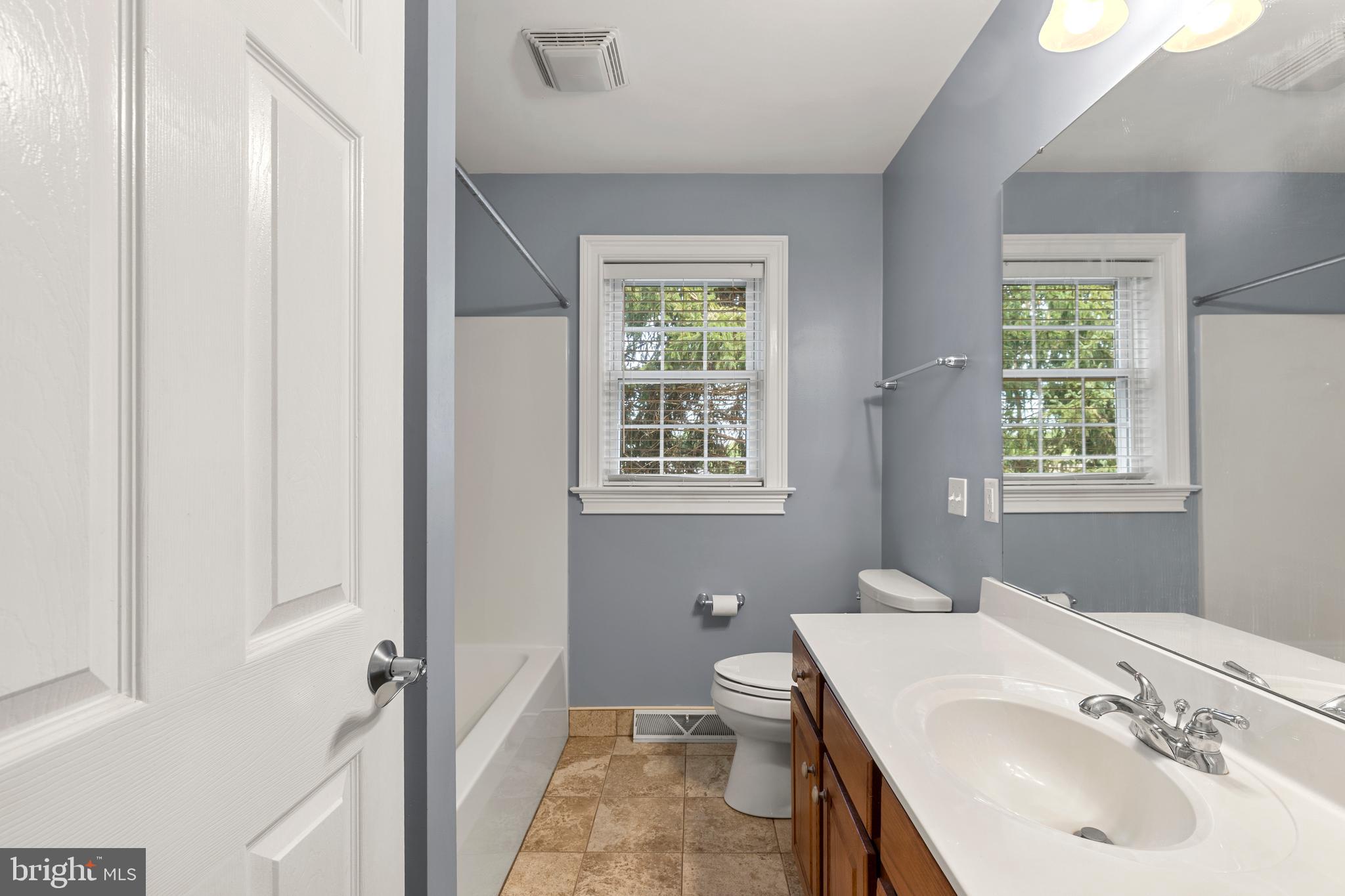 2717 Kreider Road Lititz, PA 17543 - Photo 25 of 33 a bathroom with a sink and a toilet