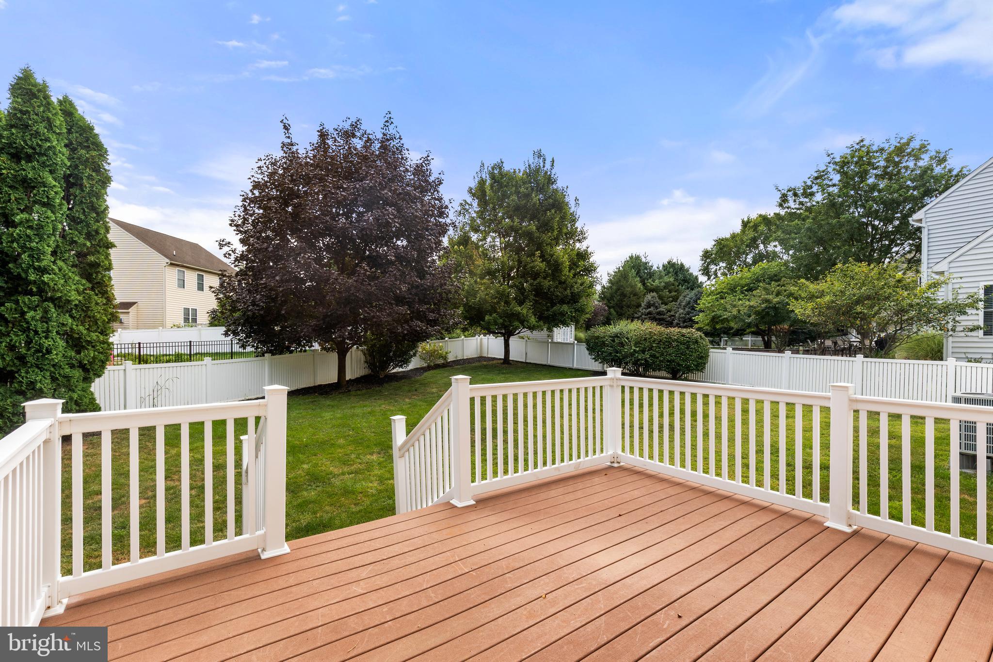 2717 Kreider Road Lititz, PA 17543 - Photo 28 of 33 a view of a wooden deck and a yard with swimming pool