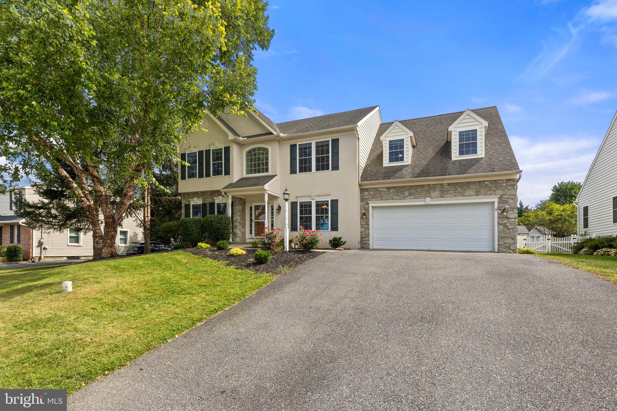 2717 Kreider Road Lititz, PA 17543 - Photo 3 of 33 a view of a house with a yard and sitting area