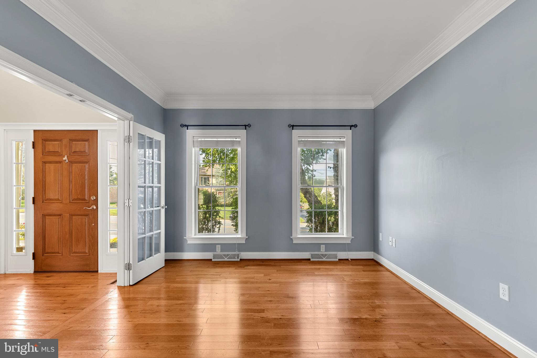 2717 Kreider Road Lititz, PA 17543 - Photo 5 of 33 a view of an empty room with window and wooden floor