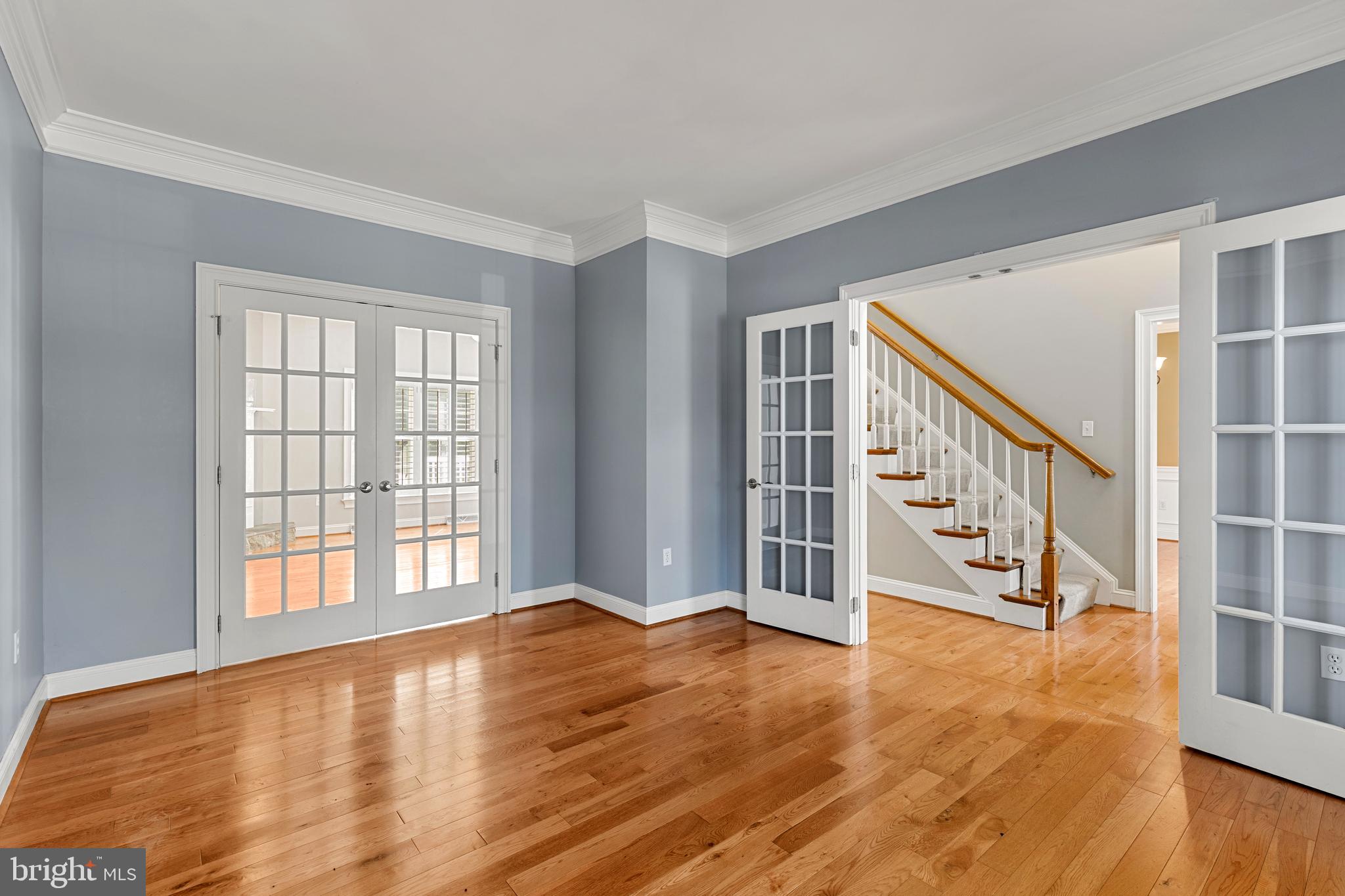 2717 Kreider Road Lititz, PA 17543 - Photo 6 of 33 a view of an empty room with wooden floor and windows