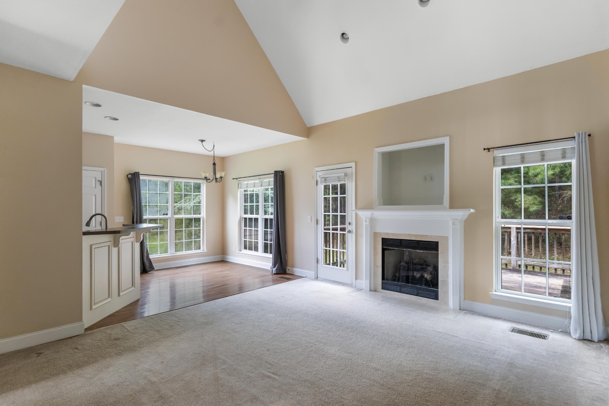 2095 Baggett Road Ringgold, GA 30736 - Photo 17 of 34 a view of a livingroom with an empty space and a fireplace