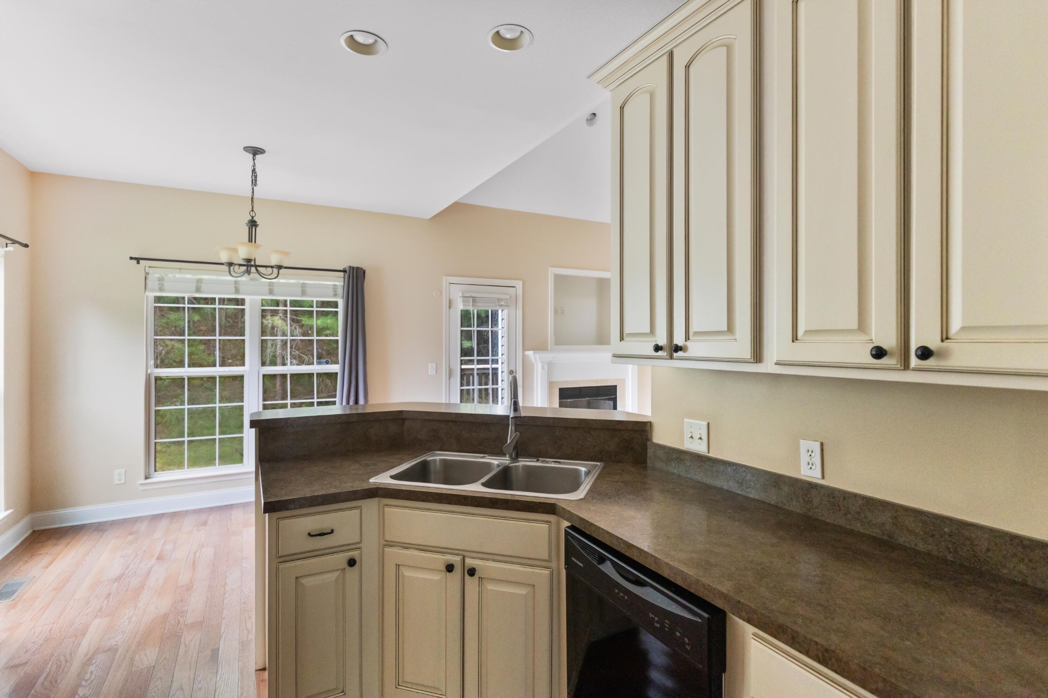 2095 Baggett Road Ringgold, GA 30736 - Photo 23 of 34 a kitchen with granite countertop a sink and a white cabinets