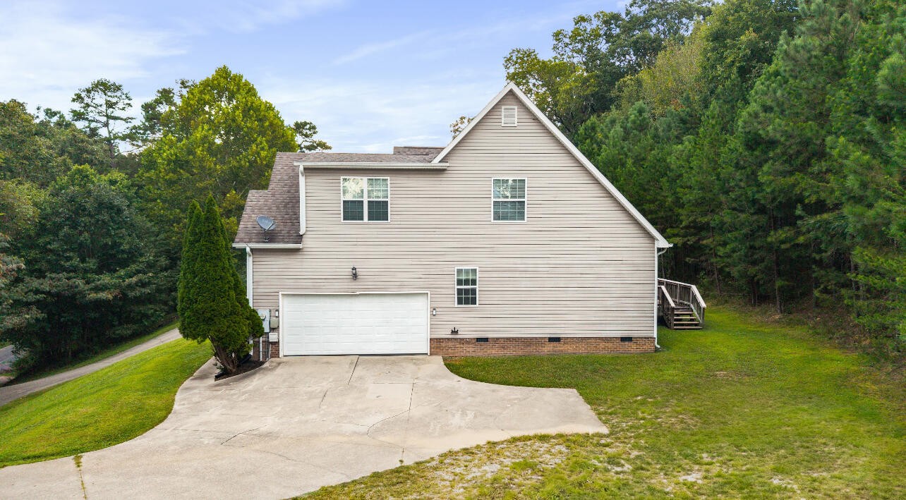 2095 Baggett Road Ringgold, GA 30736 - Photo 29 of 34 a view of a house with a yard