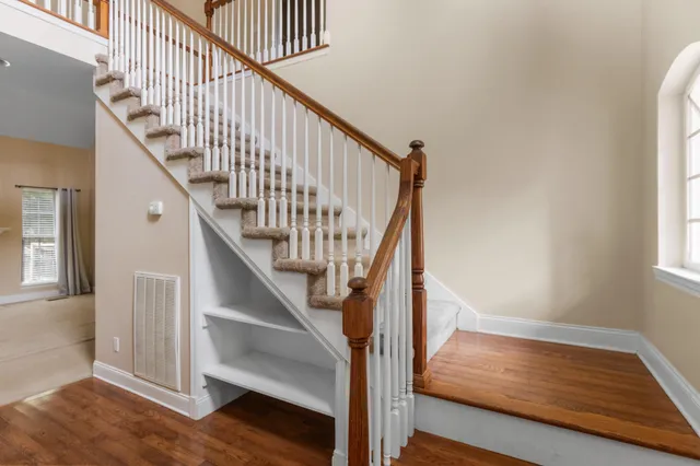a view of entryway with wooden floor