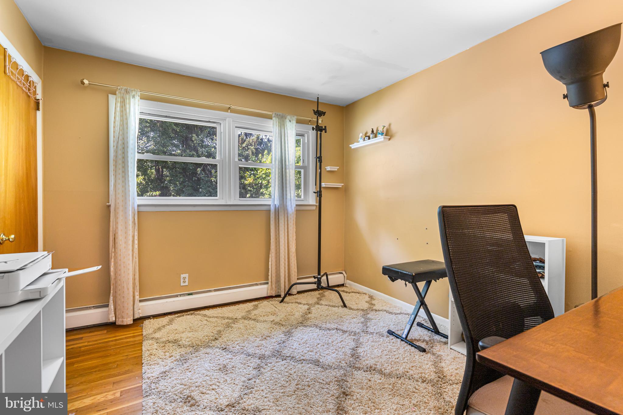 3076 Westminster Road Bethlehem, PA 18017 - Photo 18 of 31 a view of a livingroom with chair and front door